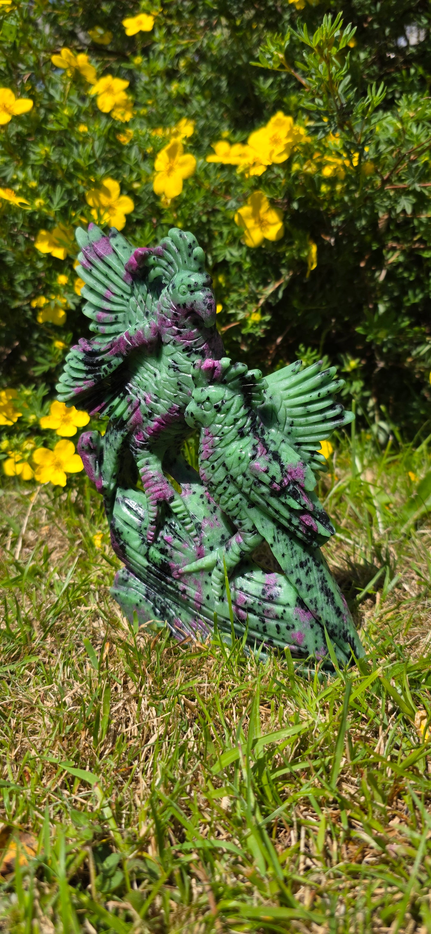 Large Ruby in ziosite birds carving statement piece.