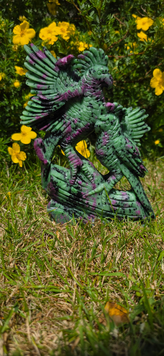 Large Ruby in ziosite birds carving statement piece.