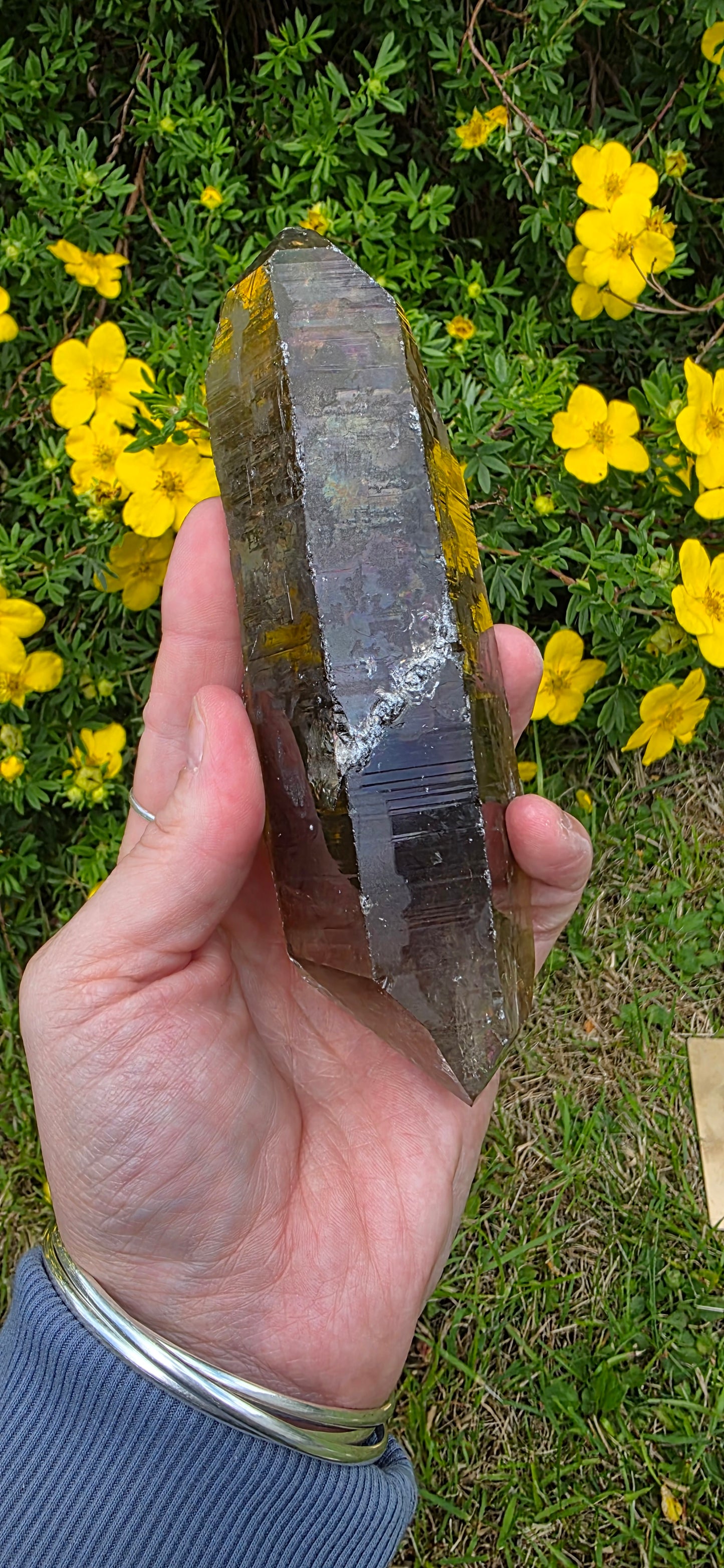 Large lightening struck smokey quartz dt on a spinning stand