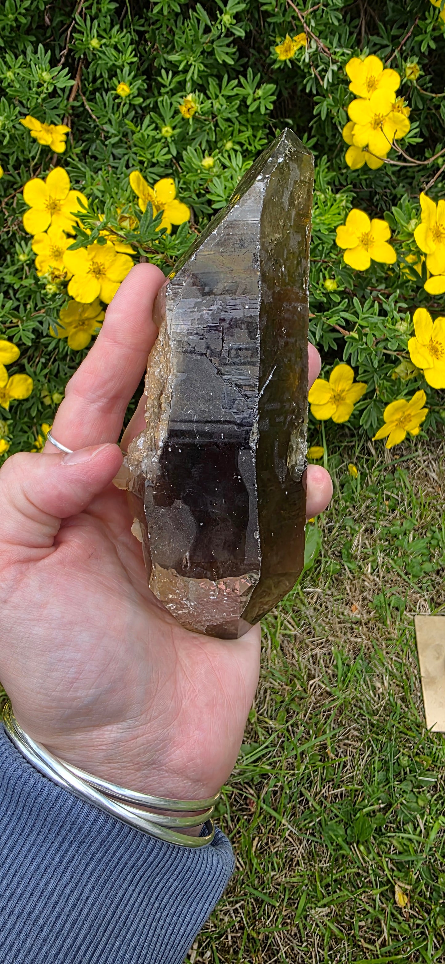 Large lightening struck smokey quartz dt on a spinning stand