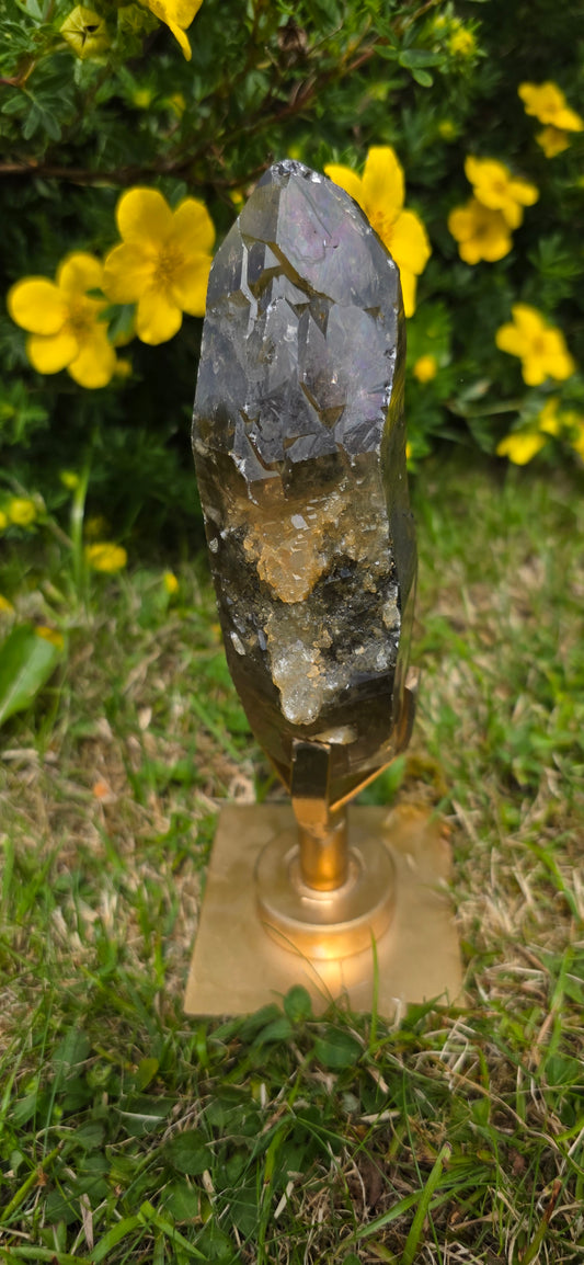 Large lightening struck smokey quartz dt on a spinning stand