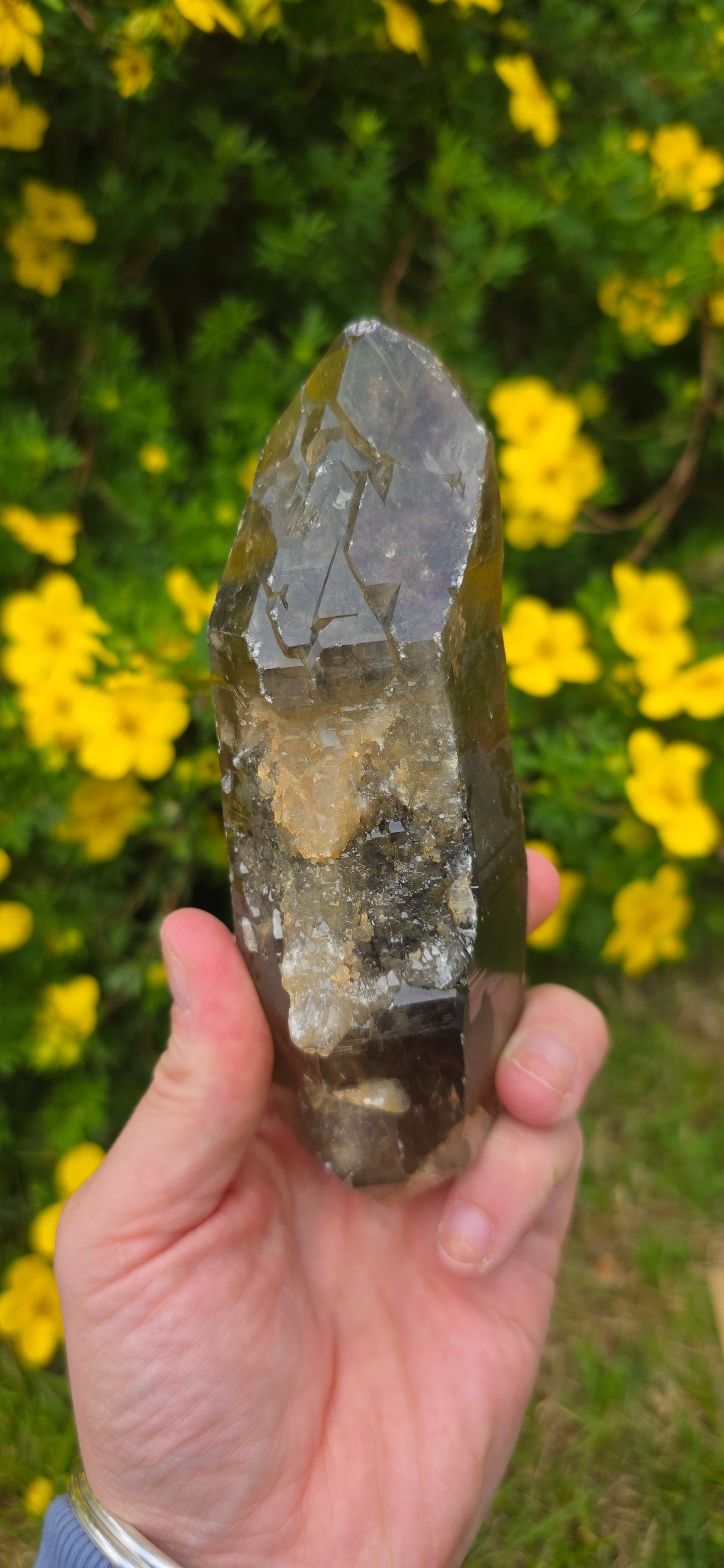 Large lightening struck smokey quartz dt on a spinning stand