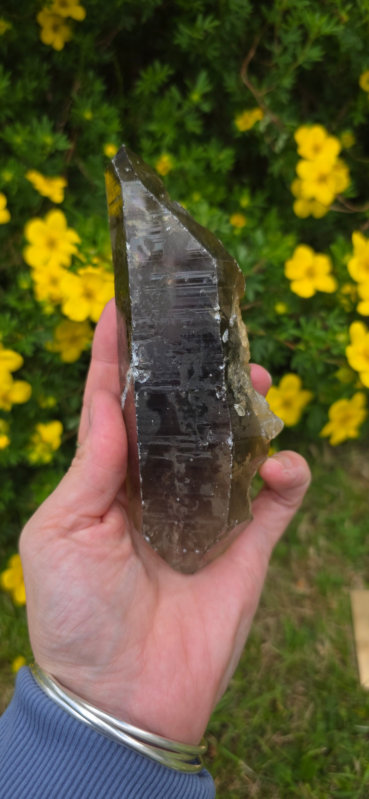 Large lightening struck smokey quartz dt on a spinning stand