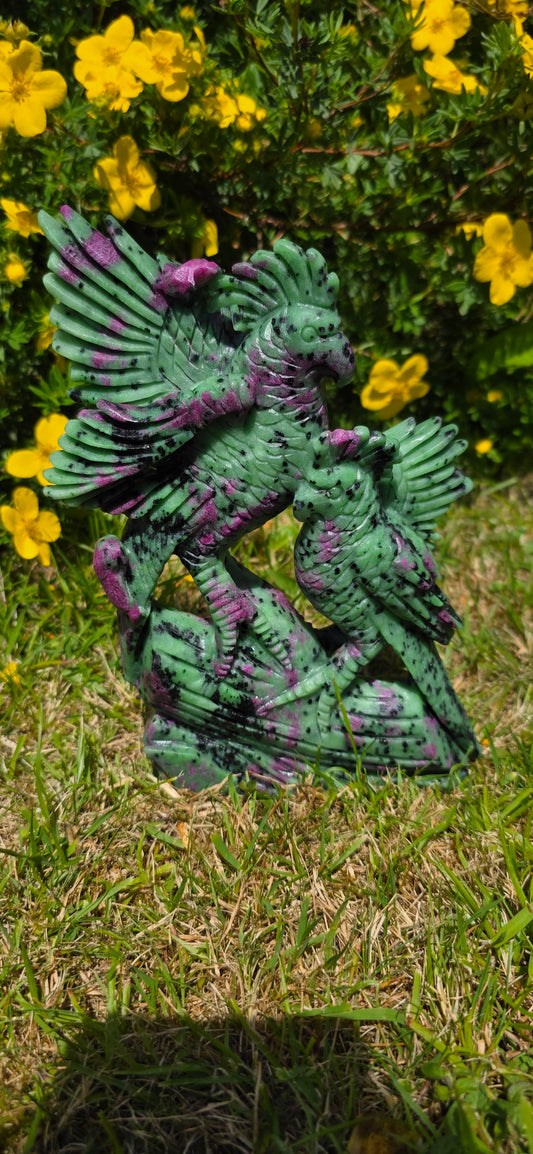 Large Ruby in ziosite birds carving statement piece.